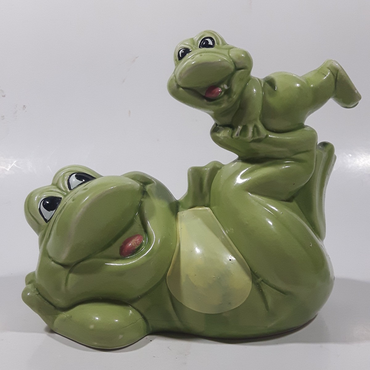 Vintage Green Frog Laying On Back Balancing Baby Frog on Foot 6" Long Ceramic Figurine Coin Bank