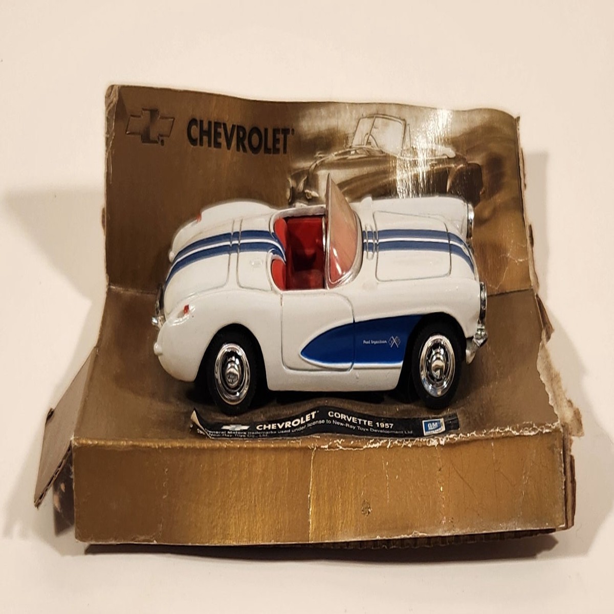 New Ray City Cruiser Collection Chevrolet 1957 Corvette Convertible White with Blue Stripes 1/43 Scale Die Cast Toy Car Vehicle On Cardboard Backing