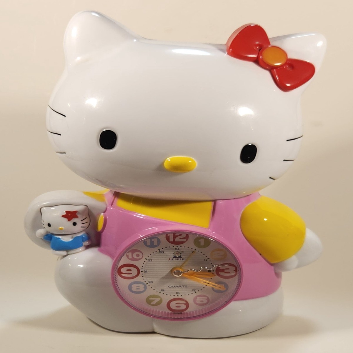Rare IE SHI DI Sanrio Hello Kitty Singing and Talking Alarm Clock Coin Bank