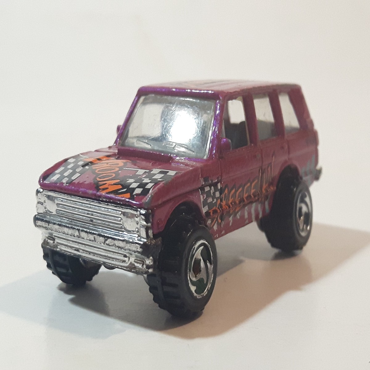 1997 Hot Wheels Biff! Bamm! Boom! Range Rover Dark Magenta Pink Die Cast Toy Car Vehicle