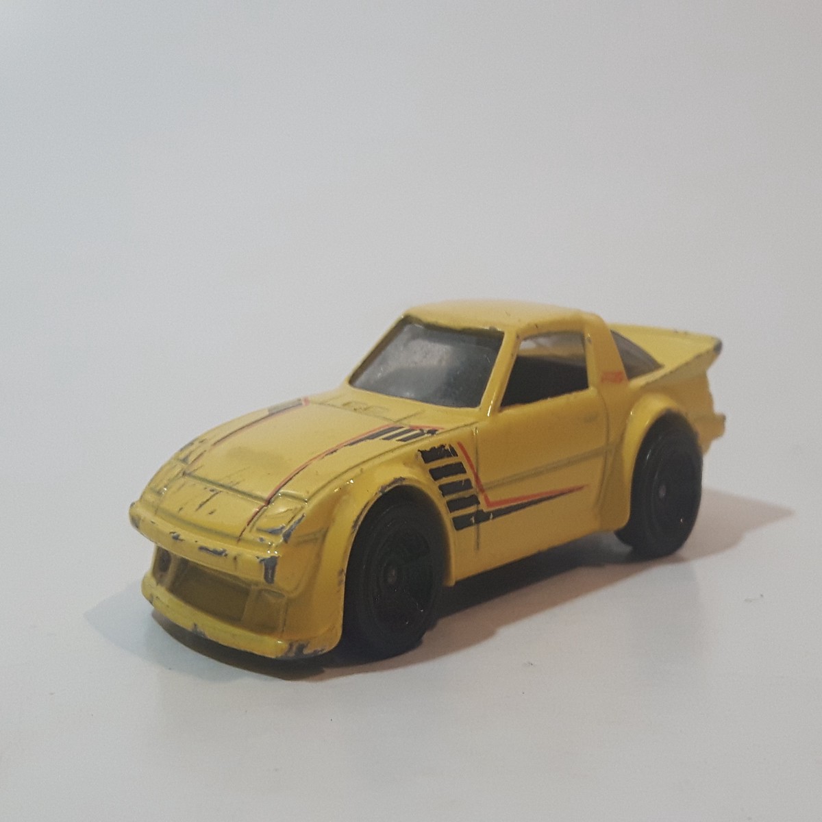 2014 Hot Wheels HW Workshop: Night Burnerz Mazda RX-7 Yellow Die Cast Toy Car Vehicle