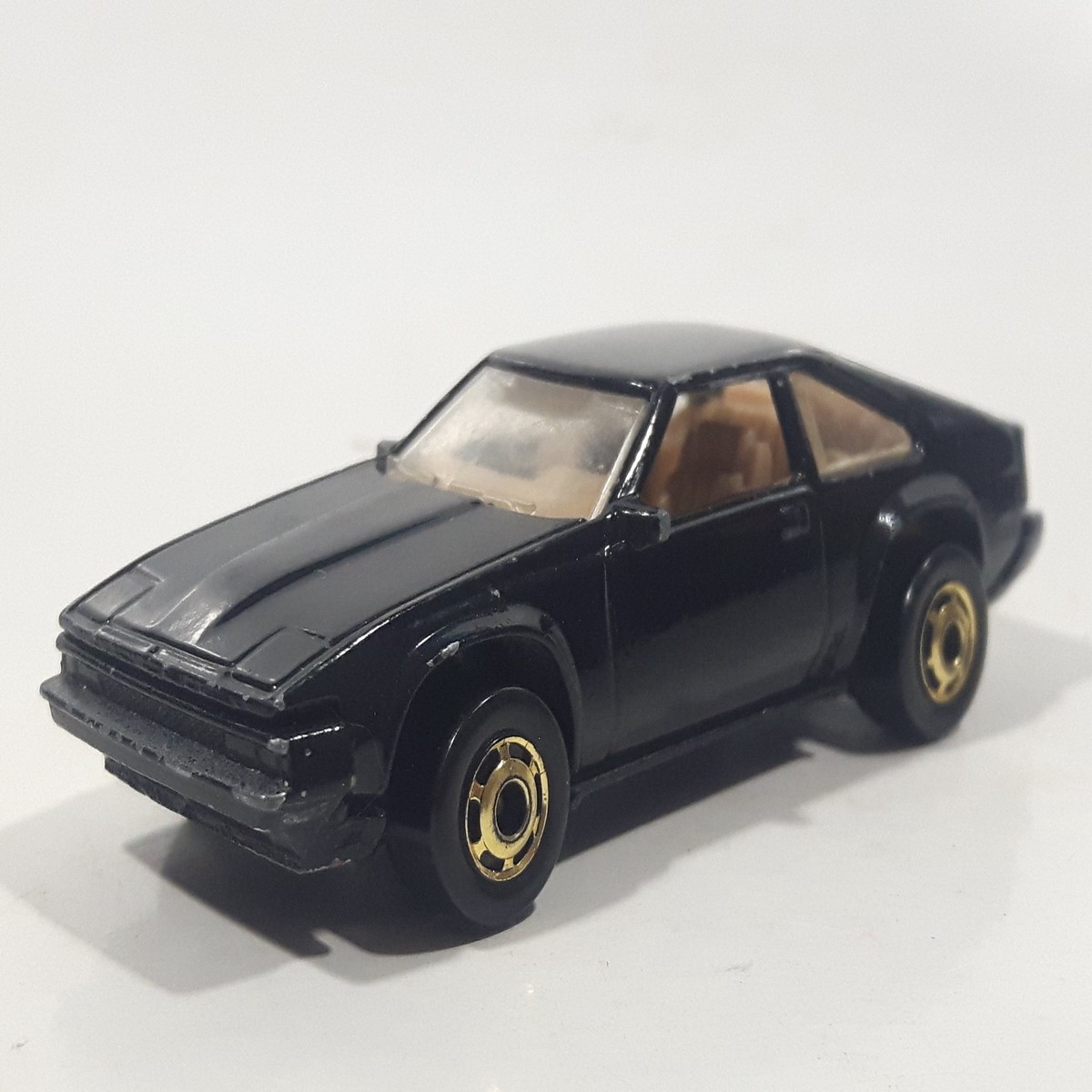 1983 Hot Wheels The Hot Ones '82 Supra Black Die Cast Toy Car Vehicle